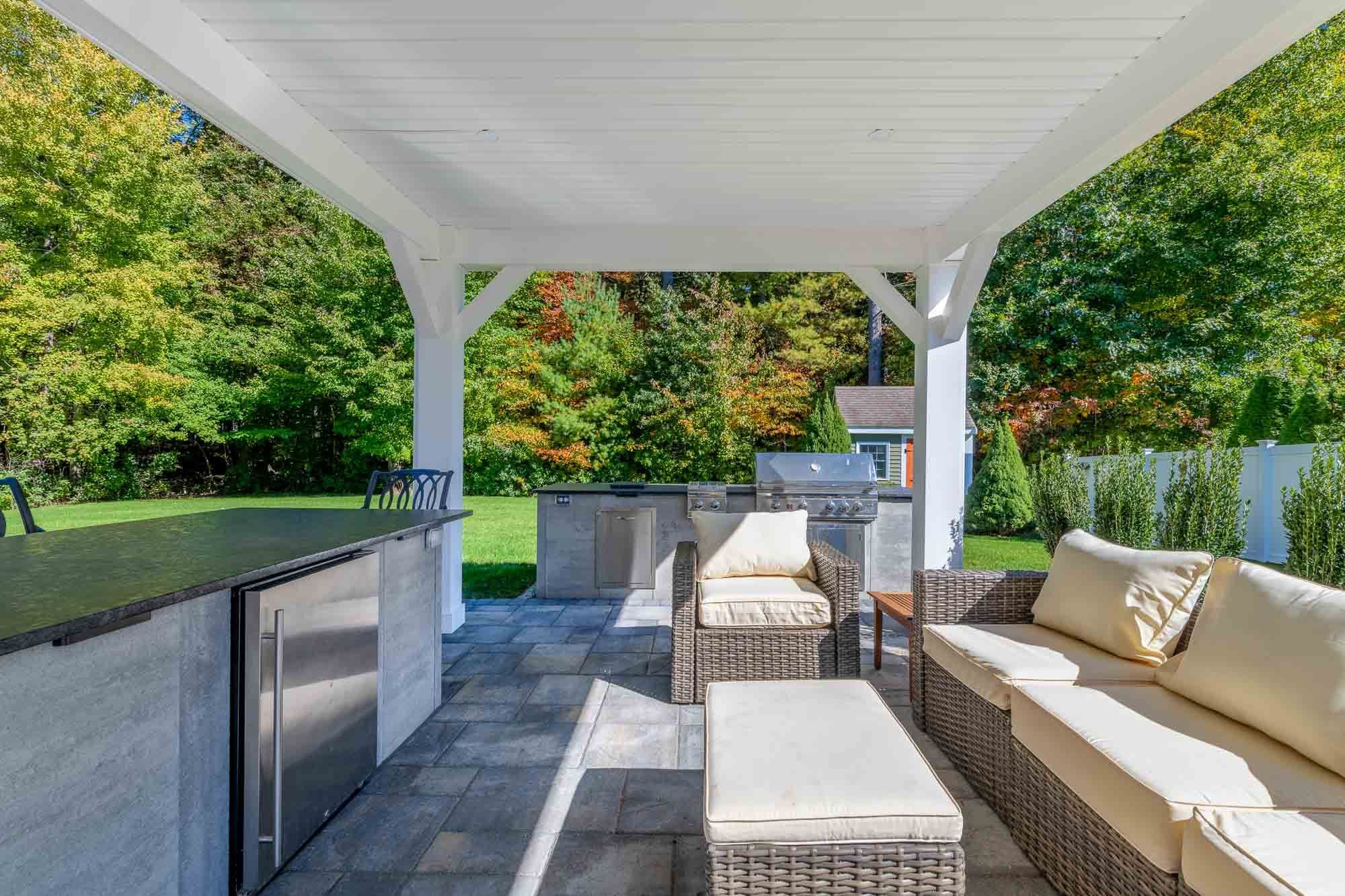 View from the bar island through the covered lounge toward the backyard.