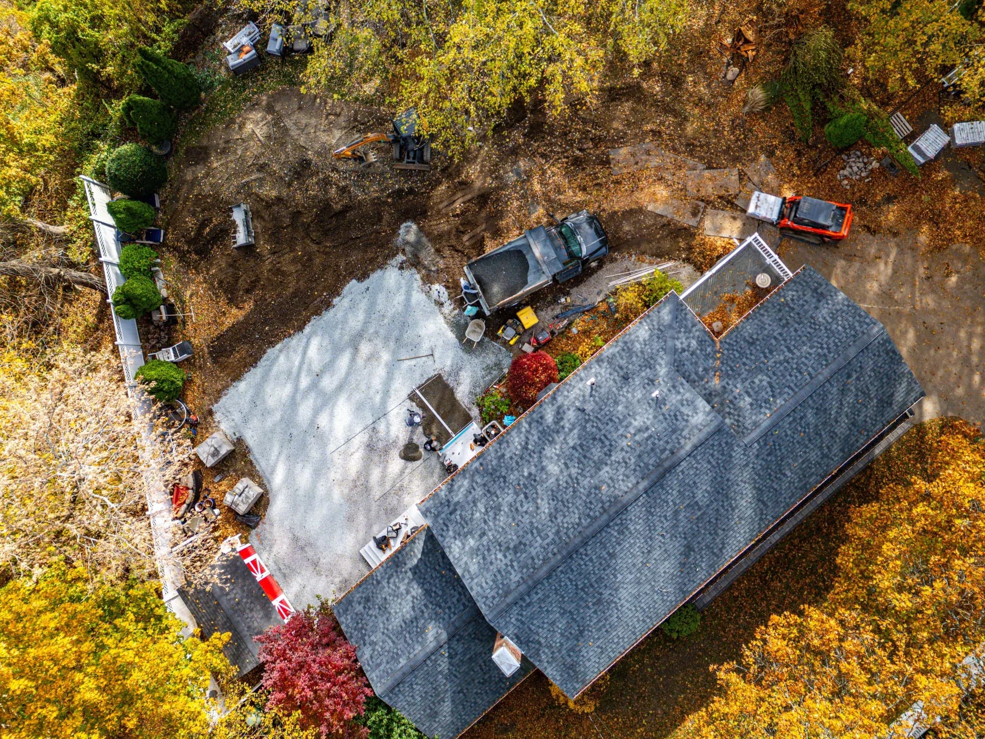 Construction progress: overhead view of site preparation and aggregate placement in Westwood, MA.